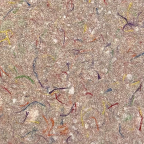 A detail of a handmade paper art piece